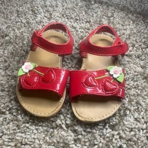 Red cherry open toe shoes